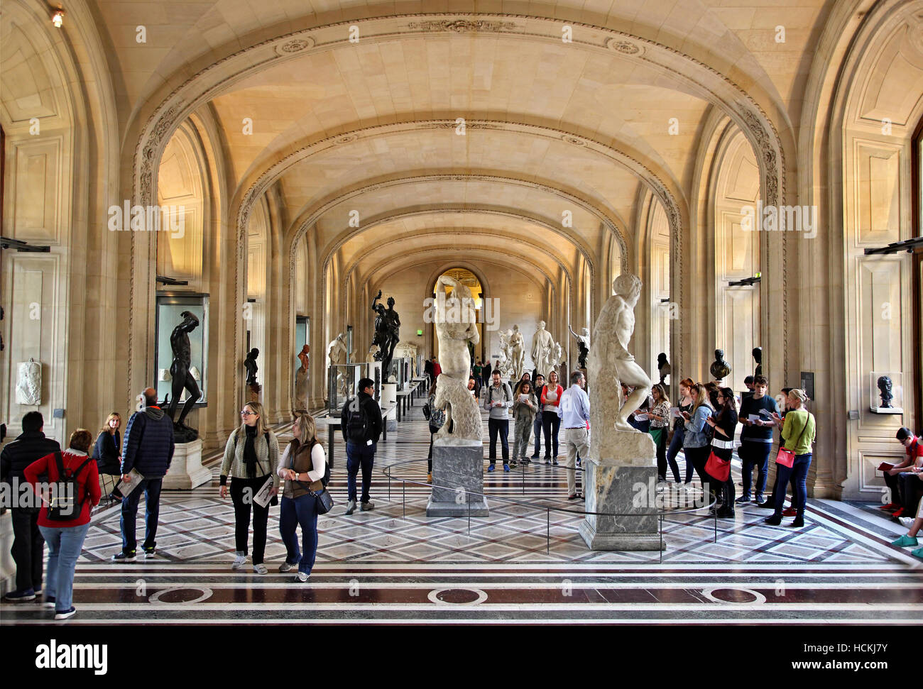 One of the halls of the Denon wing in Louvre museum (the one with the 'Dying Slave' by Michelangelo) dedicated to sculpture. Stock Photo
