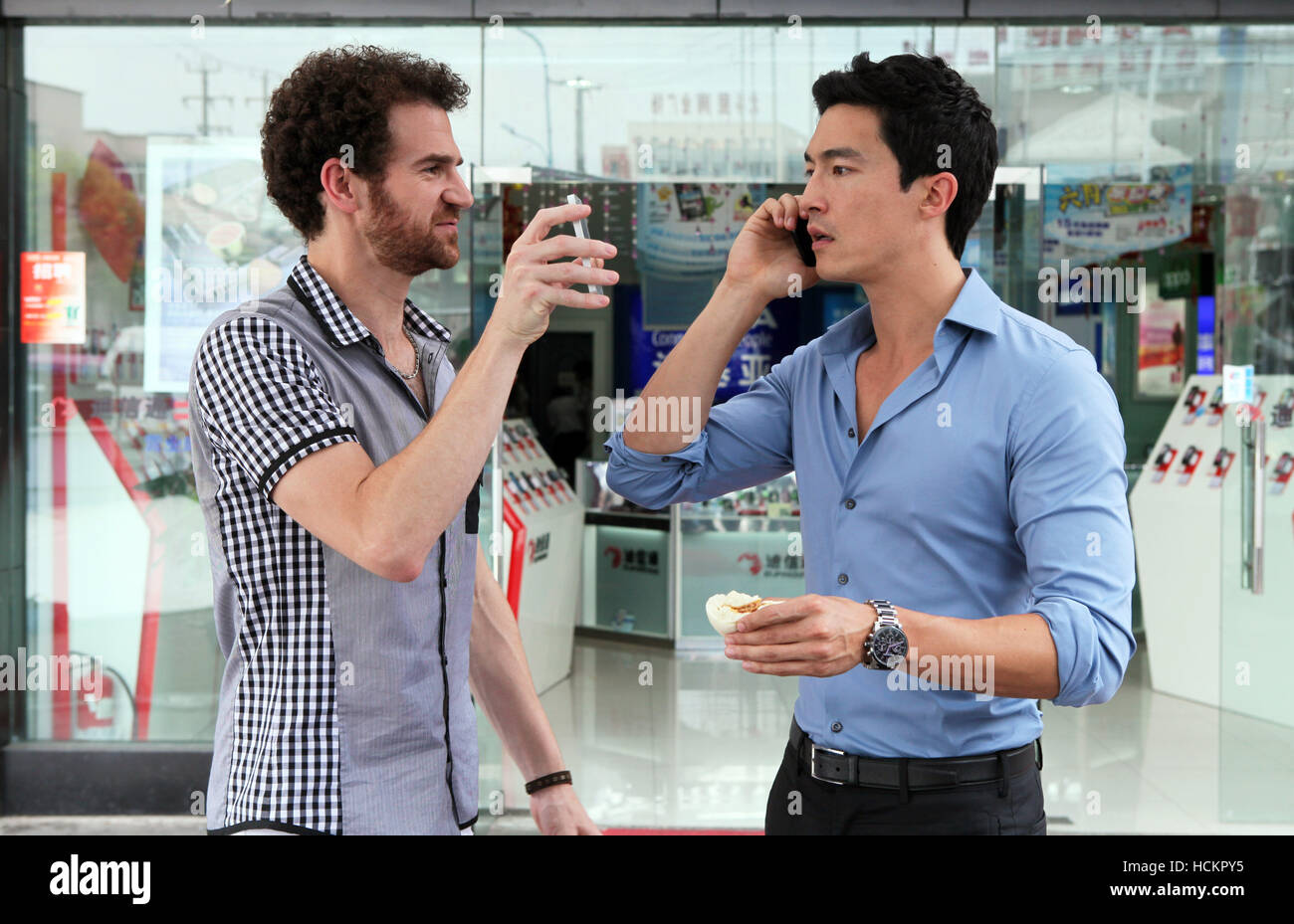 SHANGHAI CALLING, from left: Sean Gallagher, Daniel Henney, 2012. ph: Gao Yiping/©Starz Media/Courtesy Everett Collection Stock Photo