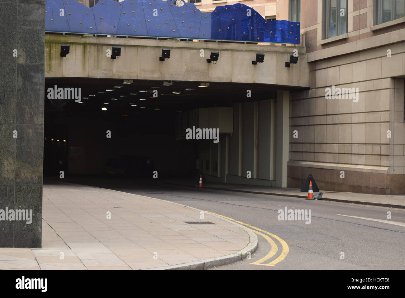 Sharp corner turn leading to a dark corner tunnel Stock Photo Alamy