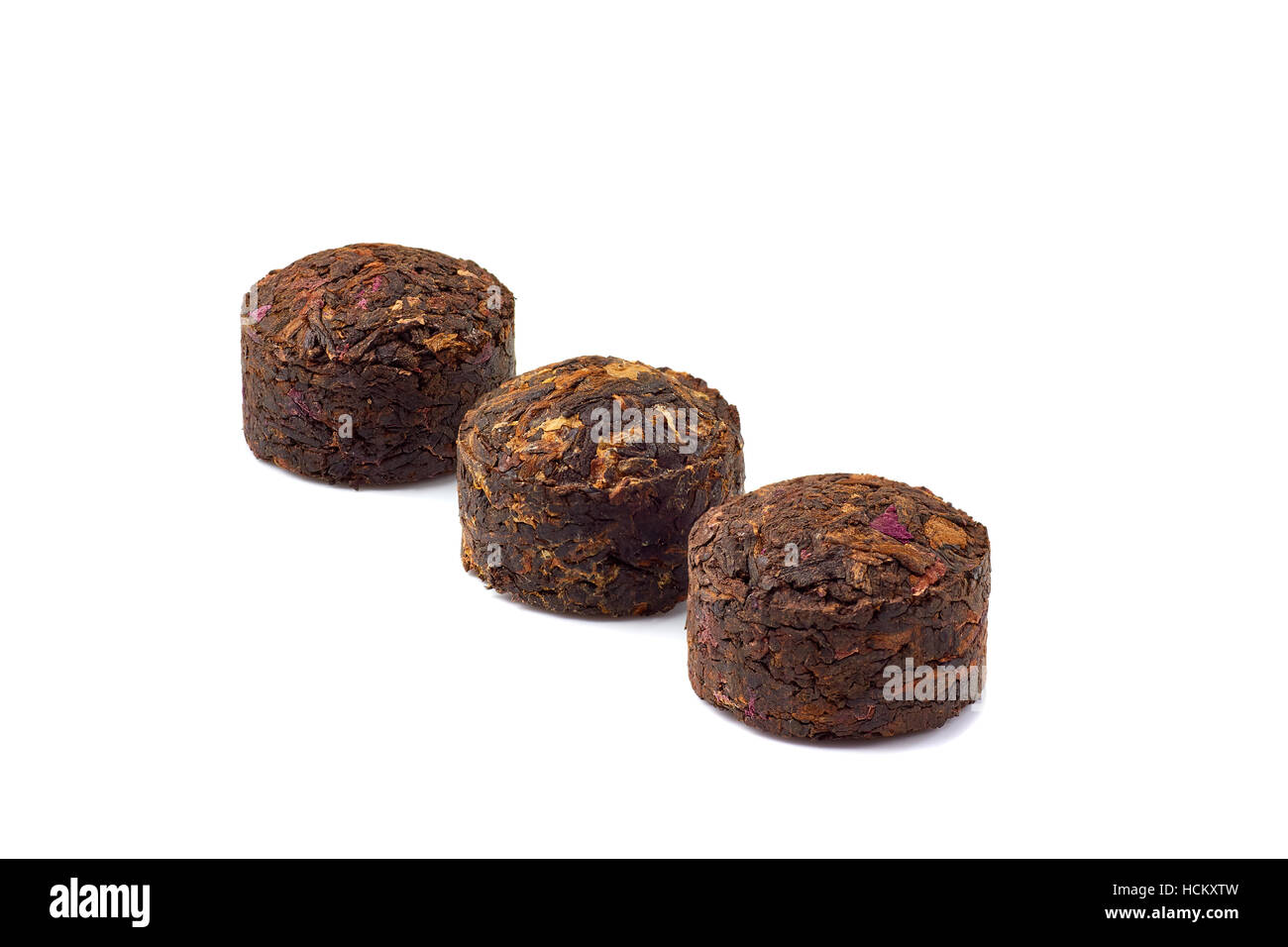 Chinese fermented Puer tea on white Stock Photo