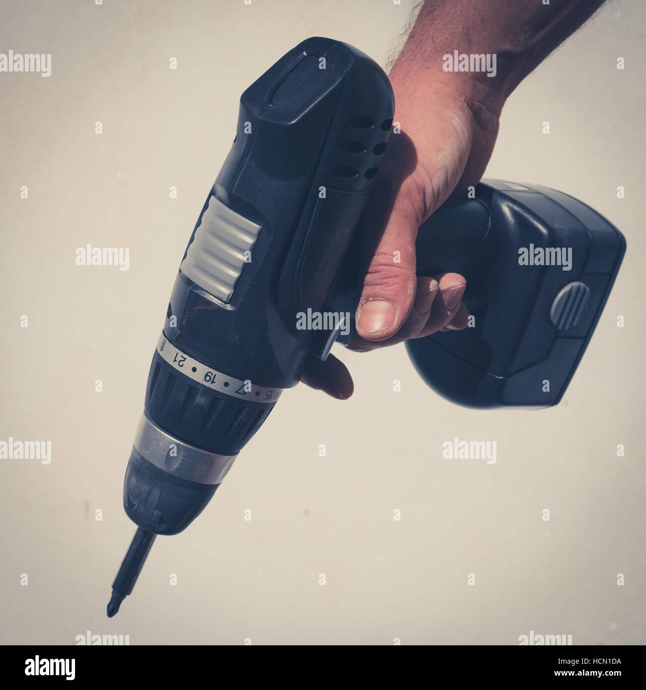 hand holding drilling machine / electric screwdriver Stock Photo Alamy