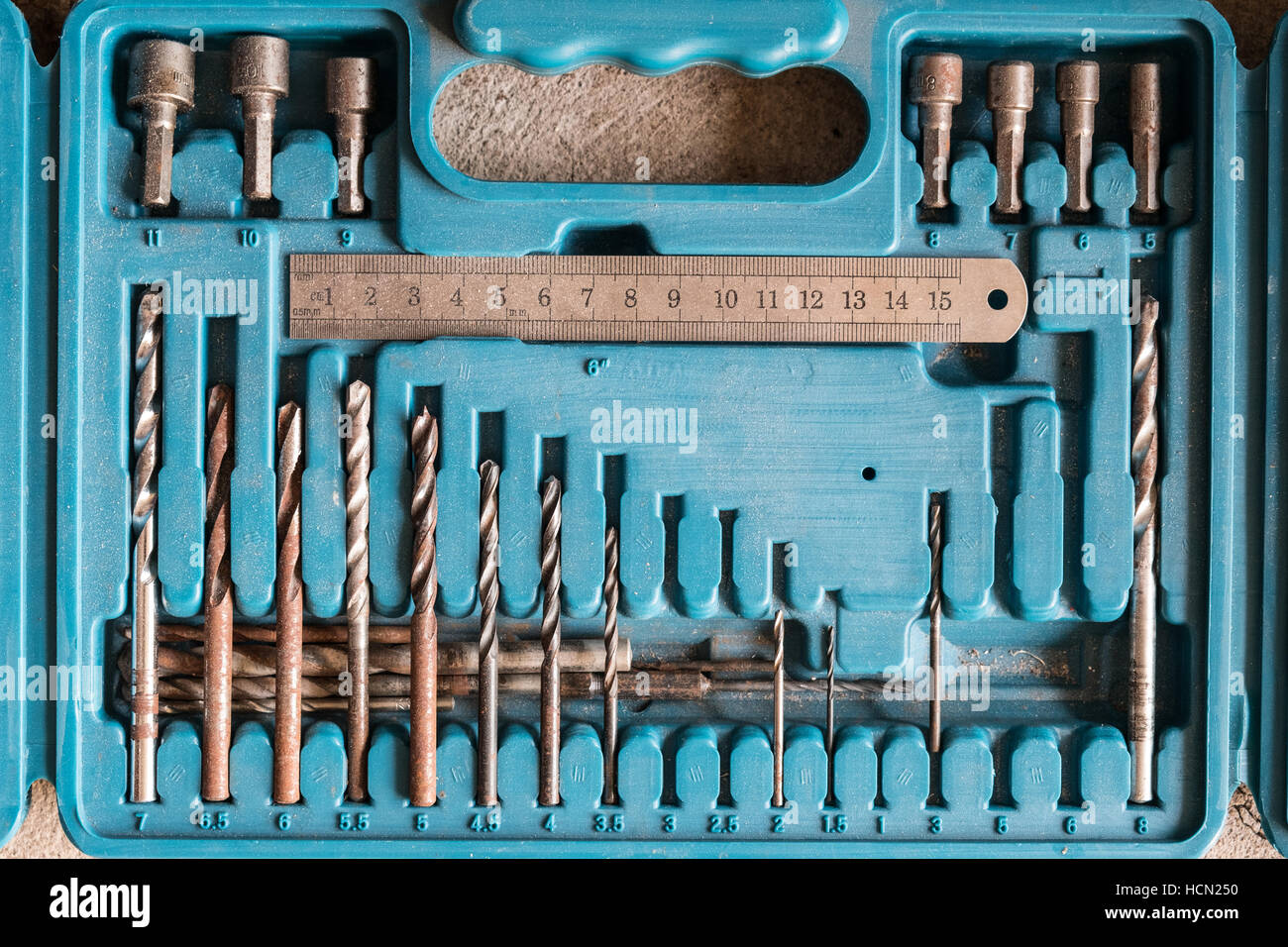 vintage drill bits / drill bit set in toolbox Stock Photo