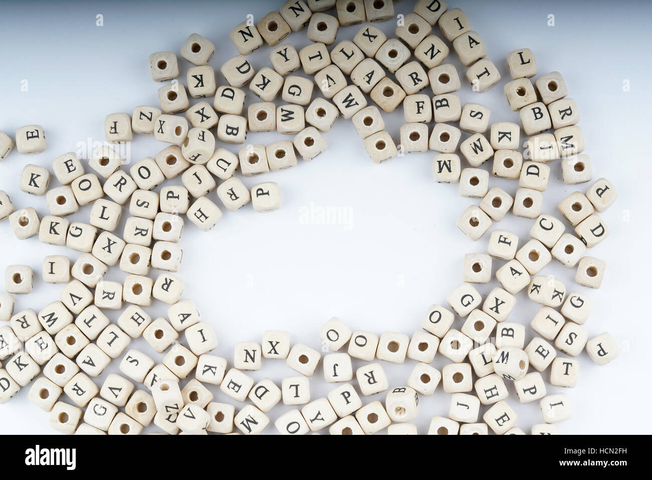 Wooden letter cube with white background Stock Photo - Alamy