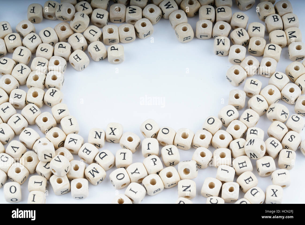 Wooden letter cube with white background Stock Photo - Alamy