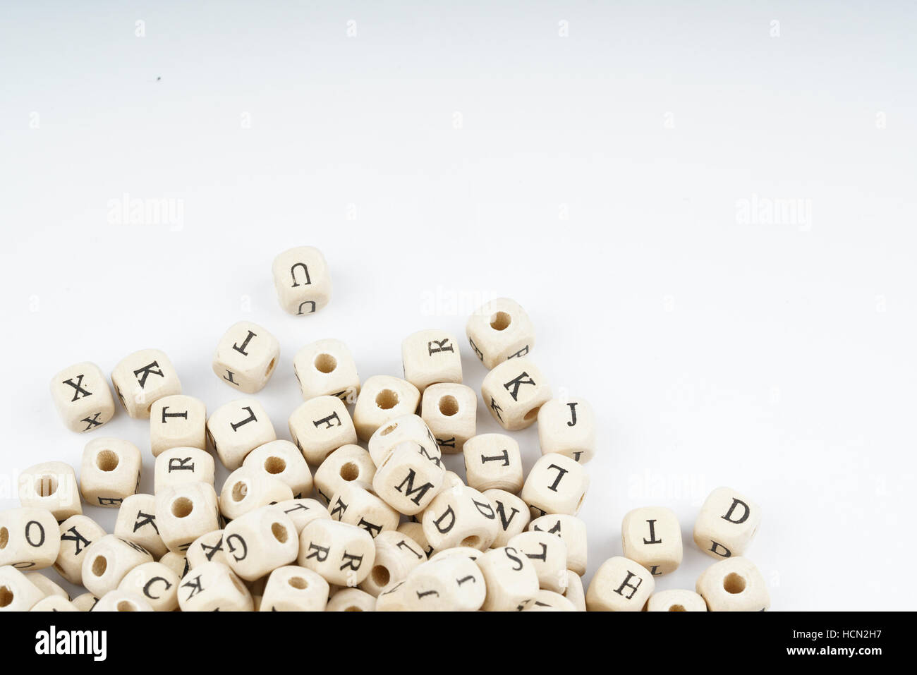 Wooden letter cube with white background Stock Photo - Alamy