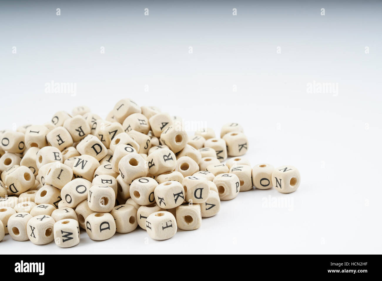 Wooden letter cube with white background Stock Photo - Alamy