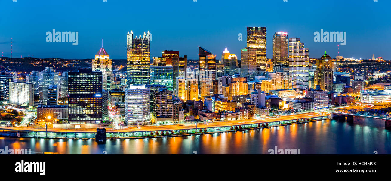Pittsburgh downtown panorama at dusk viewed from Grandview Overlook across Monongahela River Stock Photo