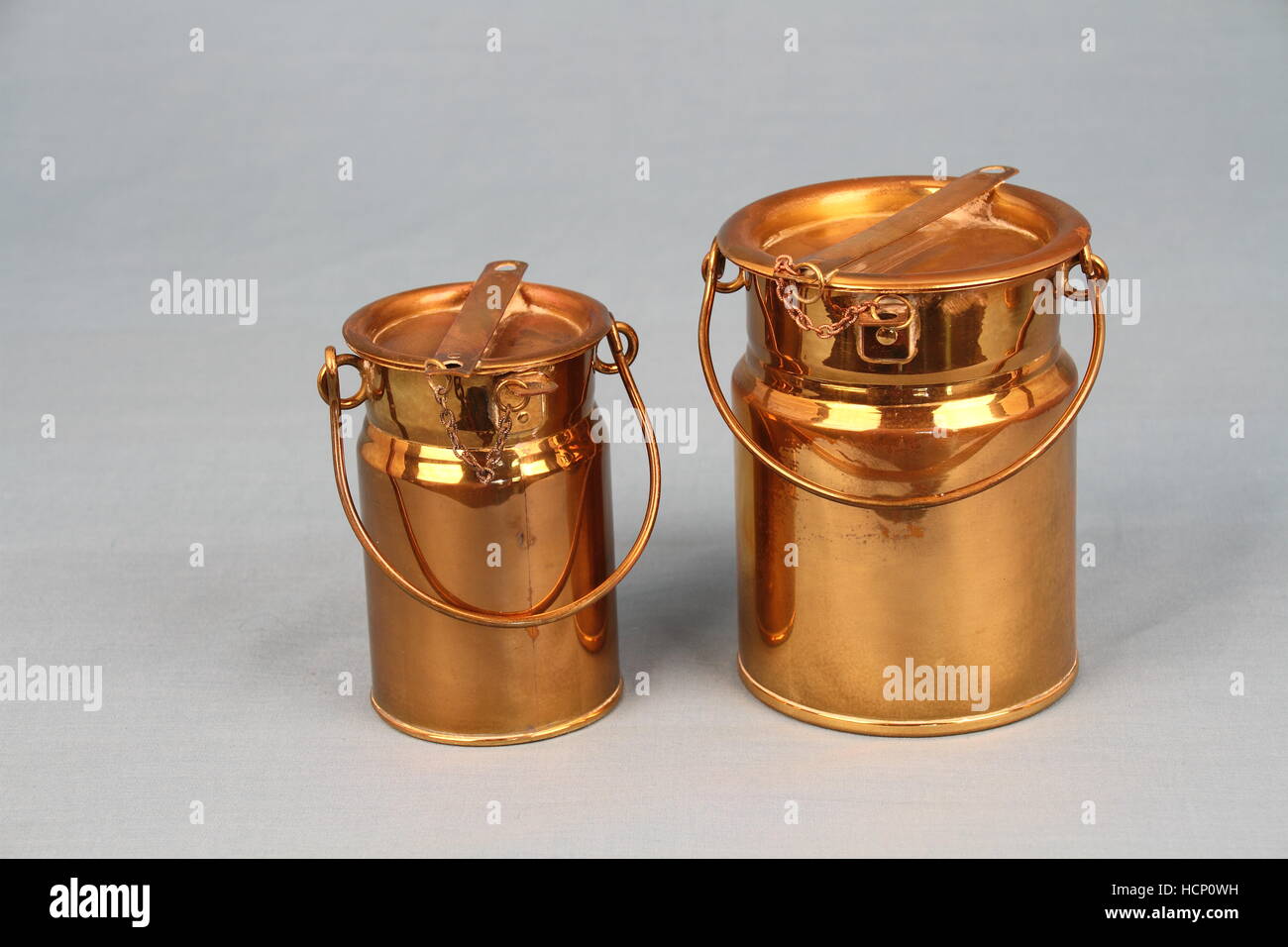Copper milk cans isolated on a clear background image with copy space