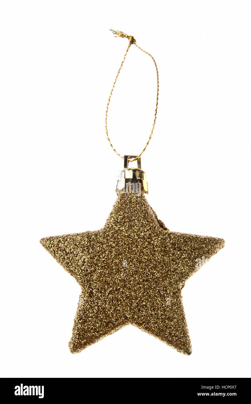 Glittering christmas gold star on white background Stock Photo - Alamy