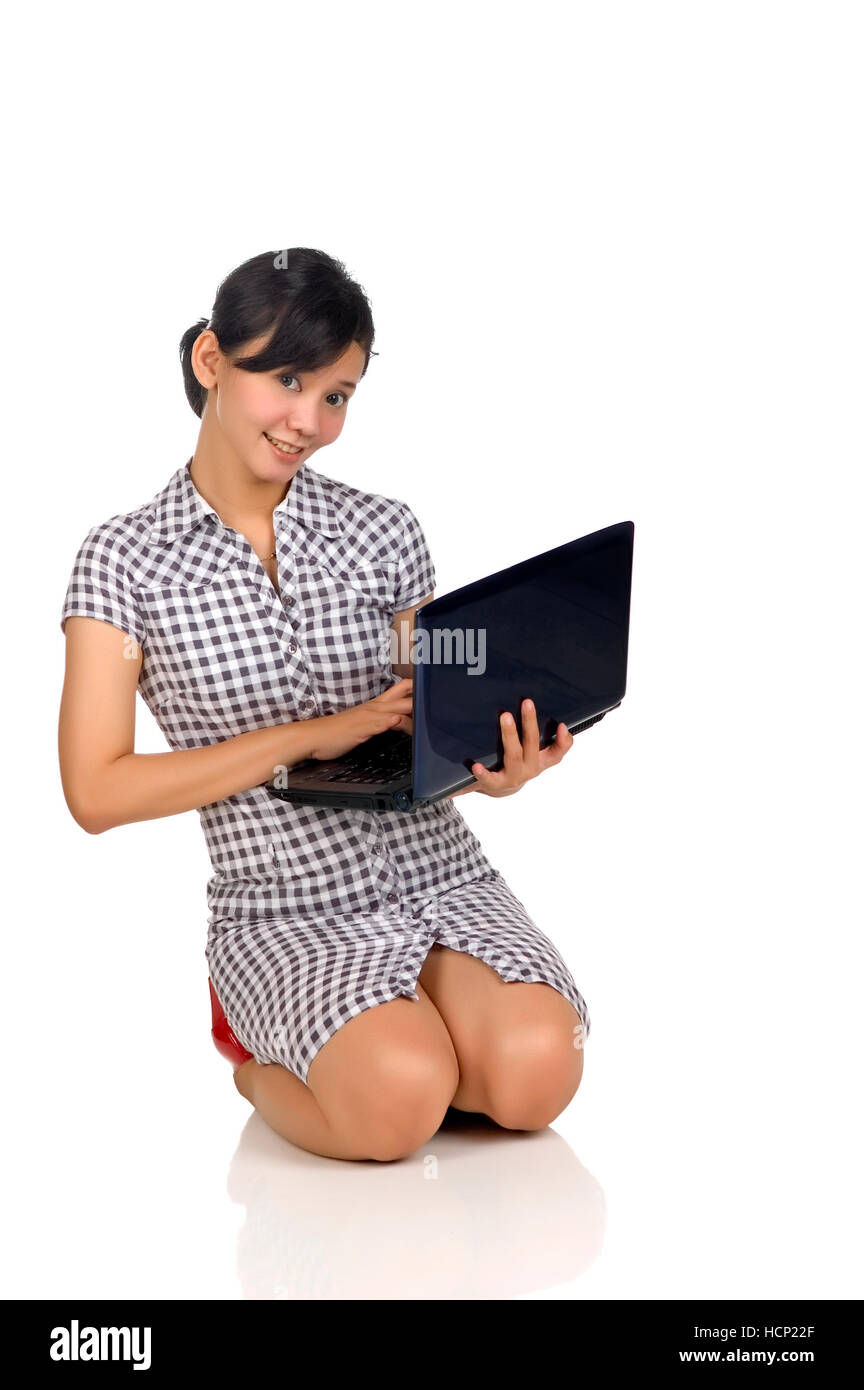 Pretty woman hold her laptop isolated on white background Stock Photo ...