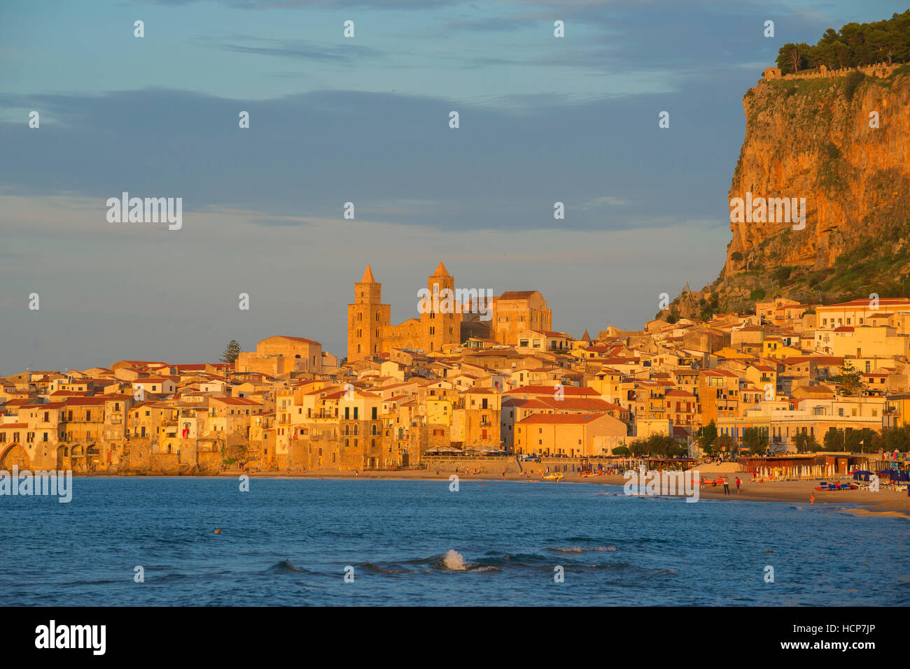 Historic centre, Santissimo Salvatore Cathedral and cliff La Rocca, evening light, Cefalu, Sicily, Italy Stock Photo