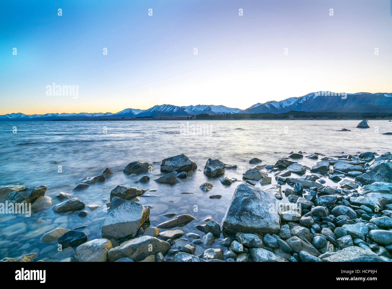 Tekapo lake with sunrise view Stock Photo - Alamy