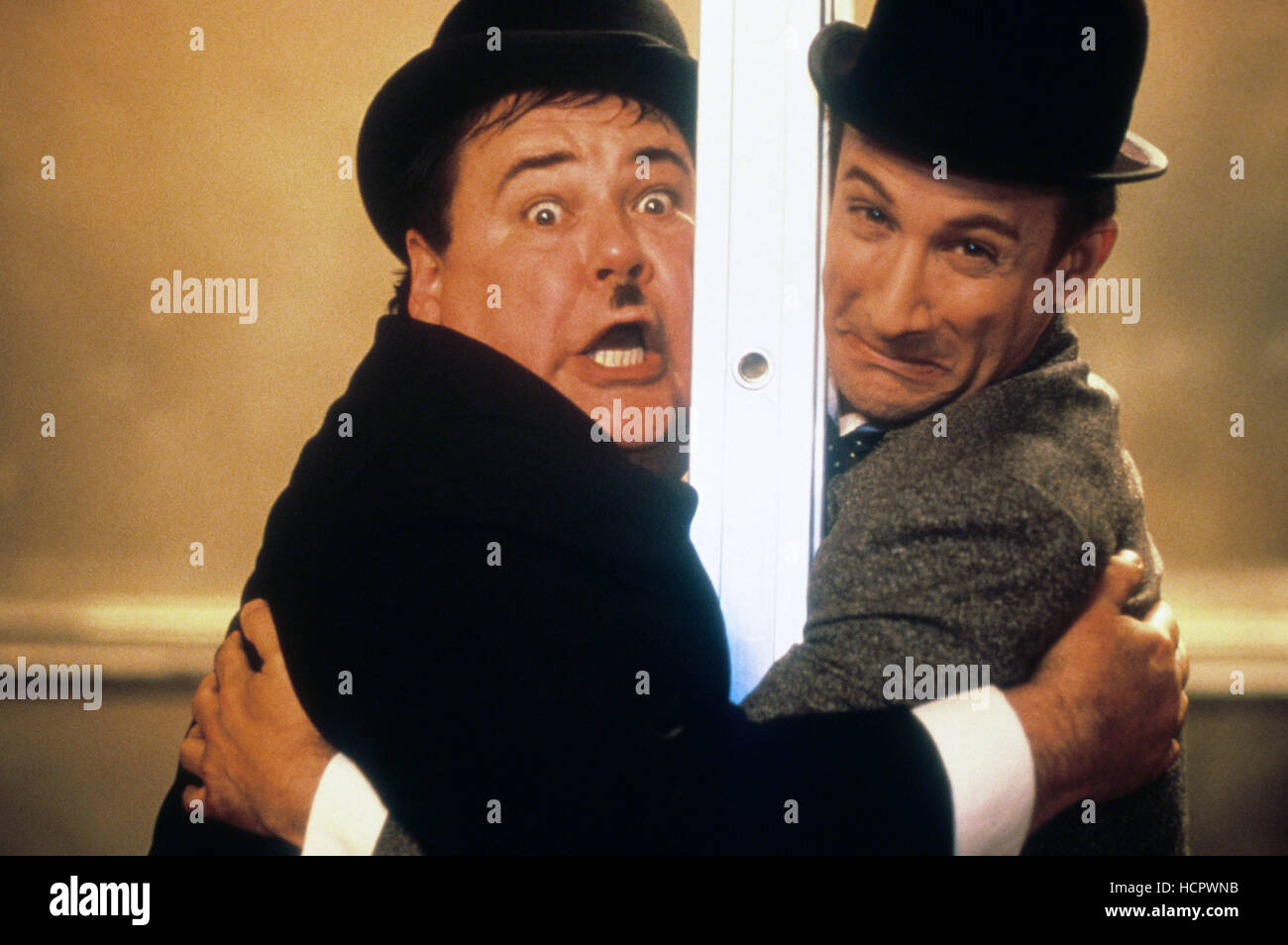 THE ALL NEW ADVENTURES OF LAUREL & HARDY IN 'FOR LOVE OR MUMMY,' from left: Gailard Sartain, Bronson Pinchot, as Laurel & Stock Photo