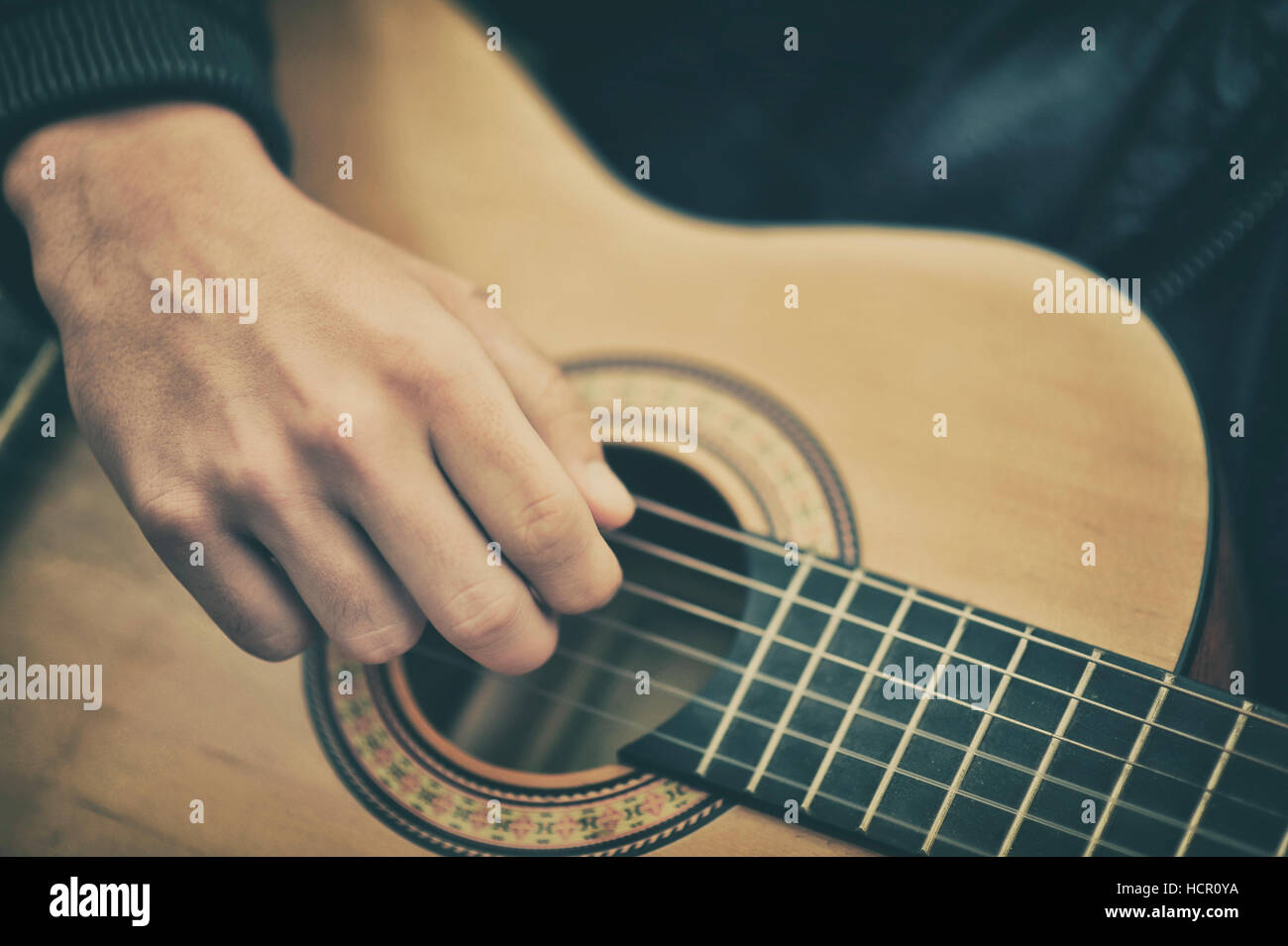 Guitar playing hi-res stock photography and images - Alamy