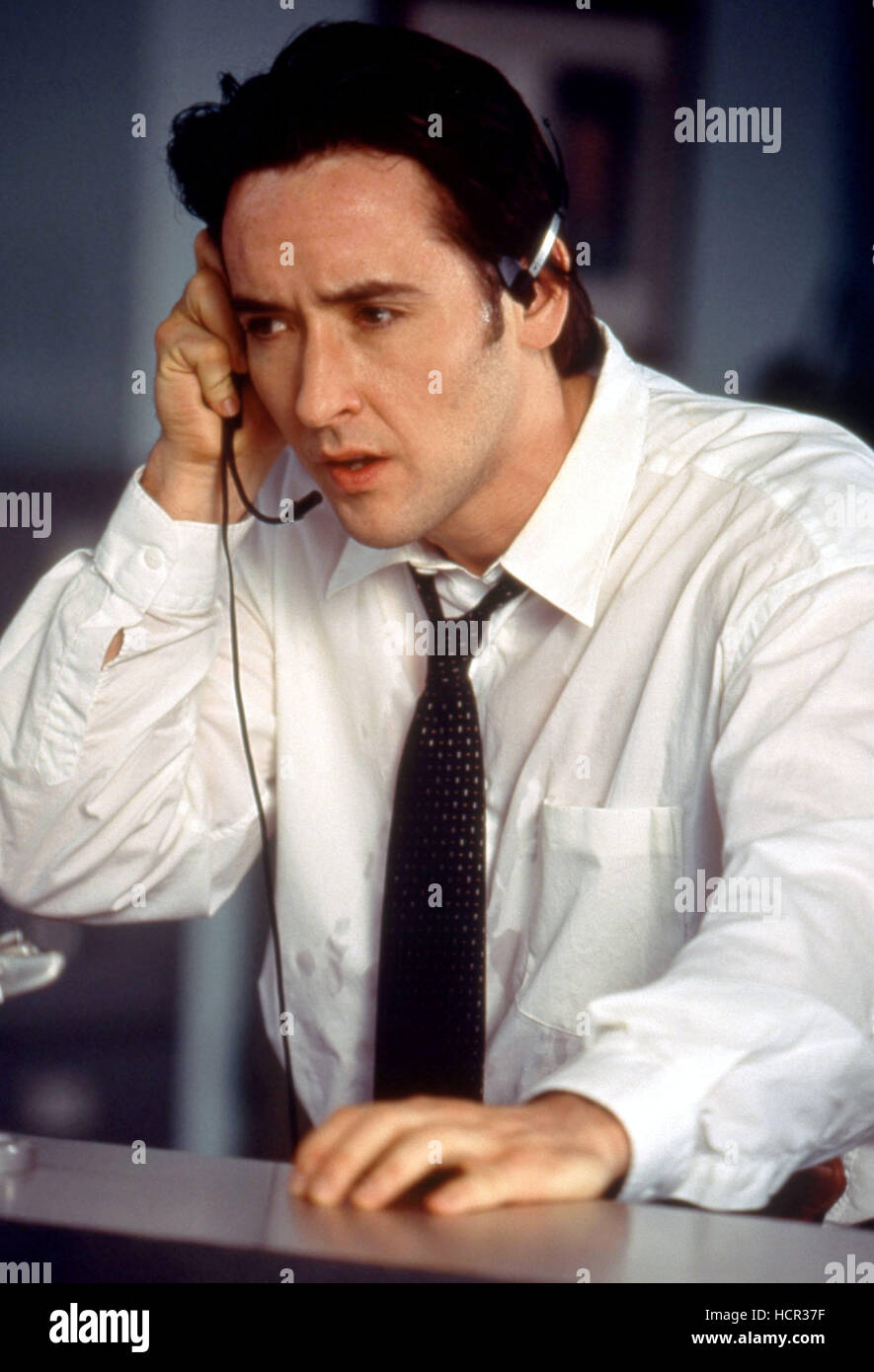 CON AIR, John Cusack, 1997, (c)Buena Vista Pictures/courtesy Everett Collection Stock Photo Alamy
