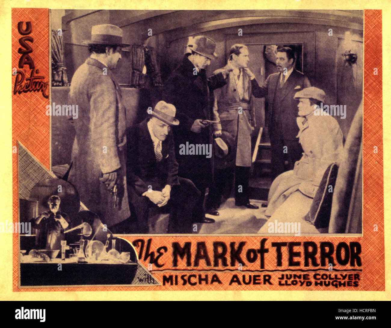 DRUMS OF JEOPARDY [aka MARK OF TERROR], Ernest Hilliard (sitting, hands