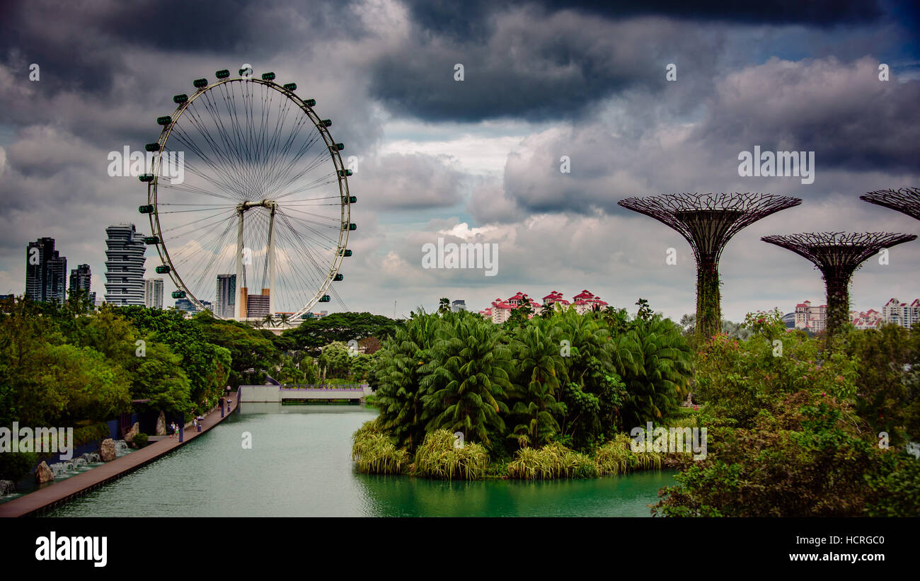 Singapore Gardens by the bay & flyer on a cloudy day Stock Photo
