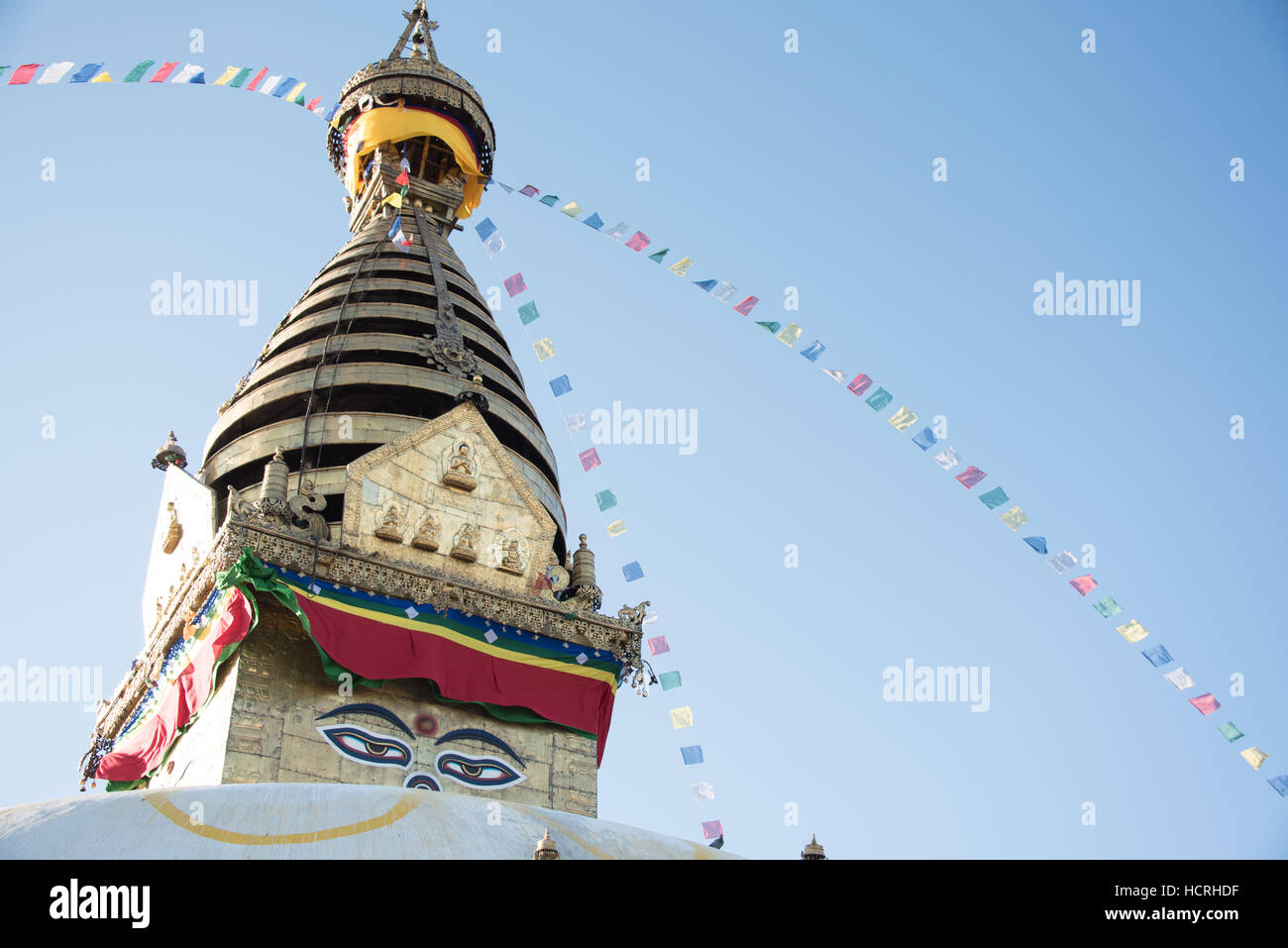 Golden crown of a Buddhist stupa on top of the Monkey temple in Kathmandu, Nepal Stock Photo