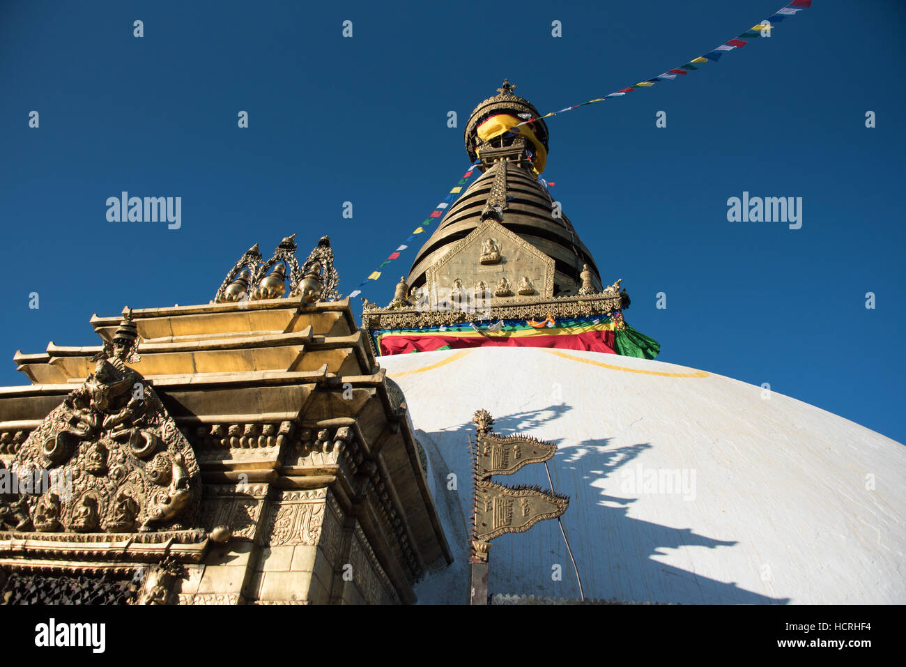 Golden Buddhist stupa on top of the Monkey temple in Kathmandu, Nepal Stock Photo
