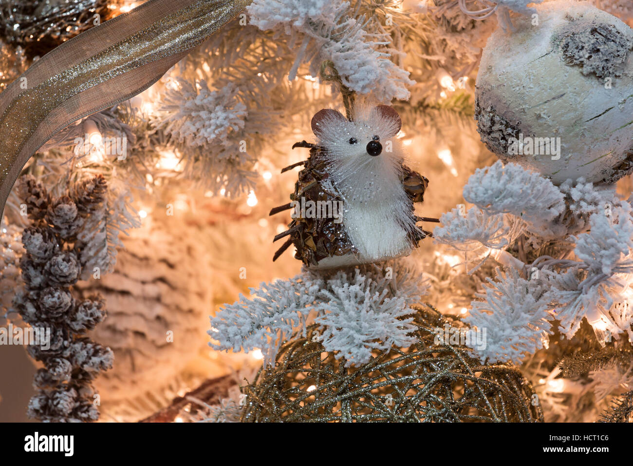 Christmas mouse ornament and decorations on a tree Stock Photo