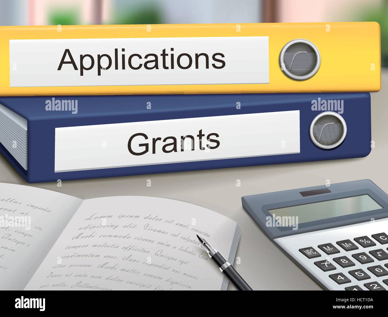 applications and grants binders isolated on the office table Stock