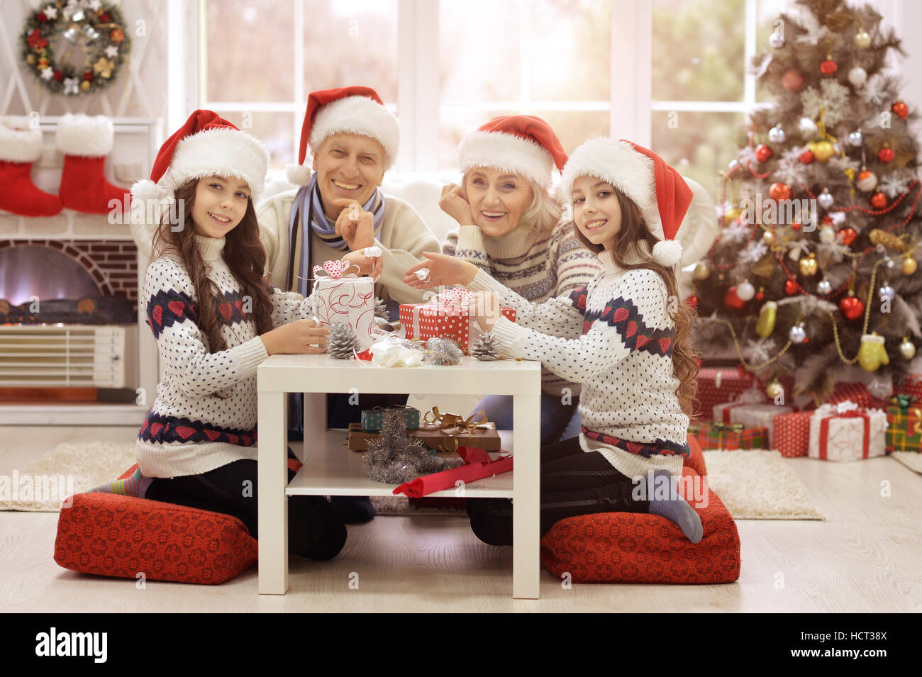 Family preparing for Christmas Stock Photo Alamy