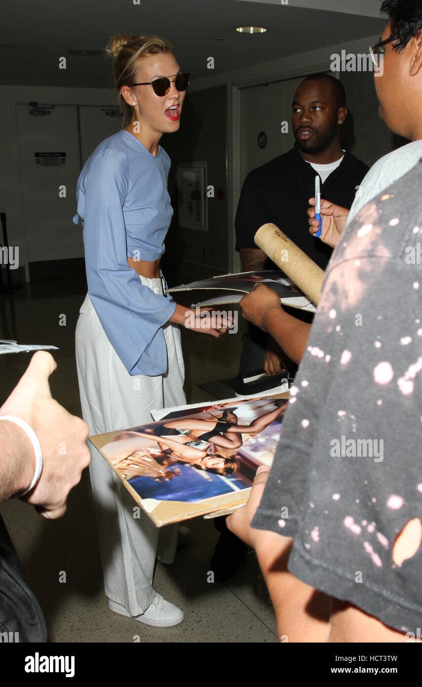 Karlie Kloss arrives at Los Angeles International Airport Featuring