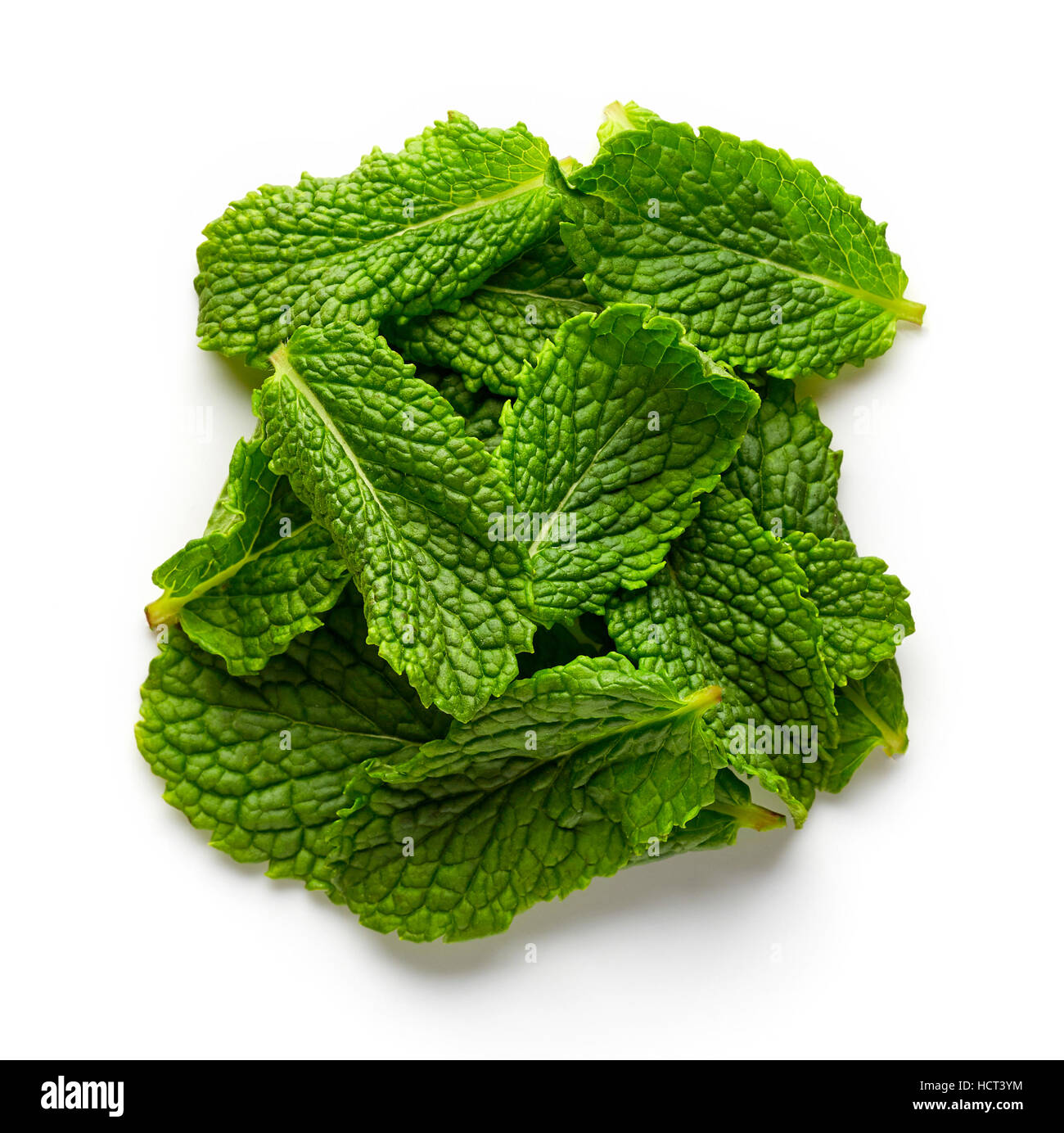 Heap of mint leaves isolated on white background, top view Stock Photo