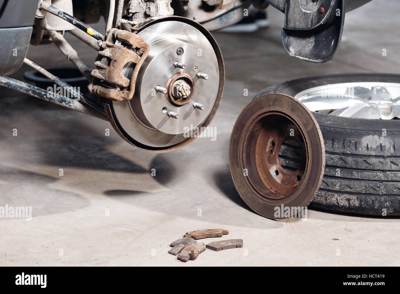 Auto mechanic repairing disc brake hi-res stock photography and images ...