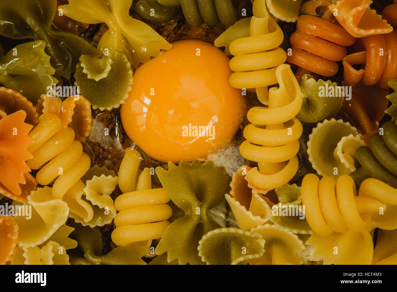 different types of colored pasta with various shapes Stock Photo