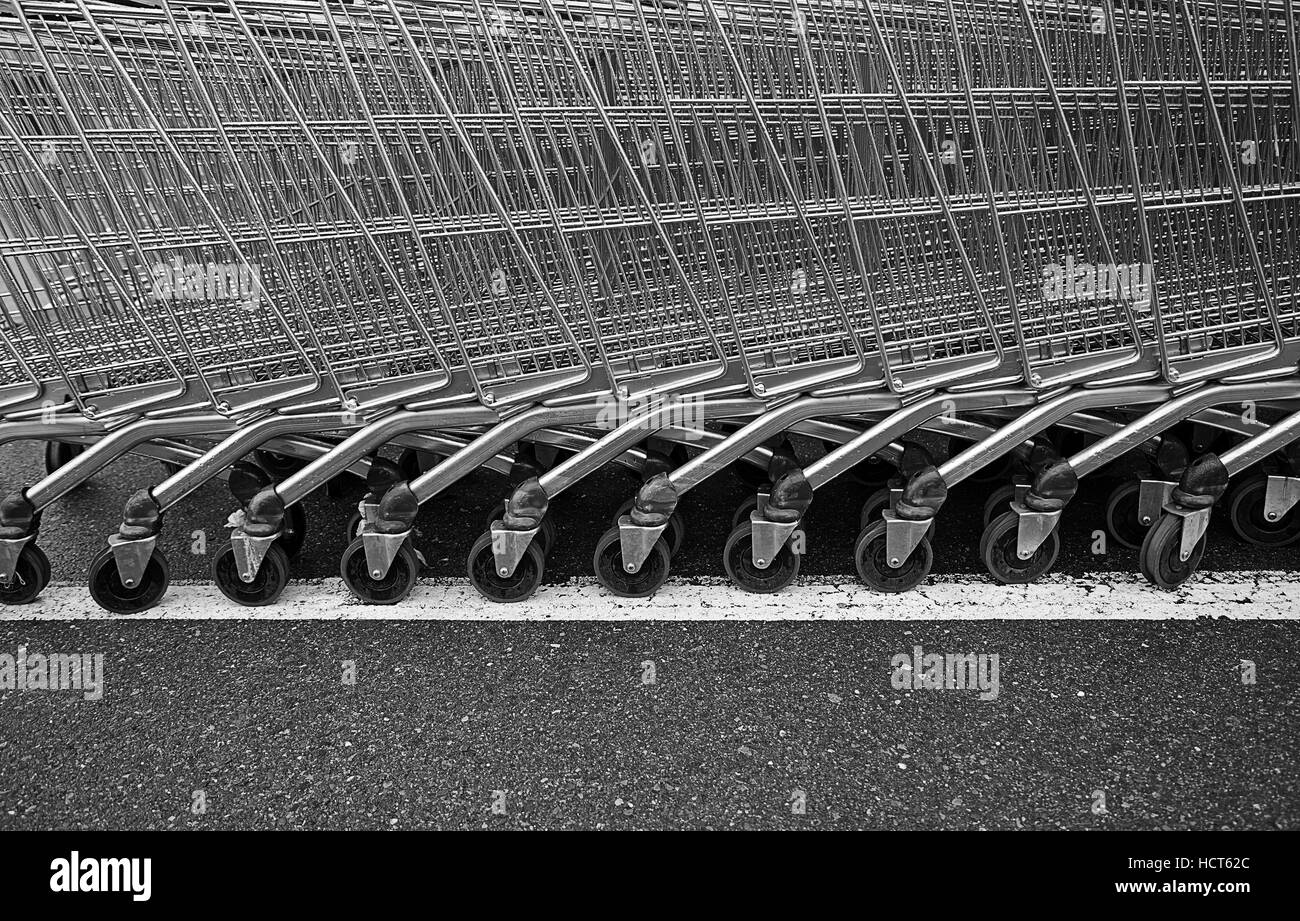 Shopping carts in a supermarket, detail of metal carts in a supermarket