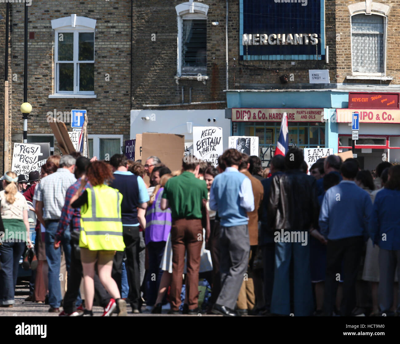 A scene portraying a race riot in Brixton in 1971 for the Sky Atlantic mini-series Guerrilla, starring Idris Elba, being filmed in North London  Featuring: Atmosphere Where: London, United Kingdom When: 17 Aug 2016 Stock Photo