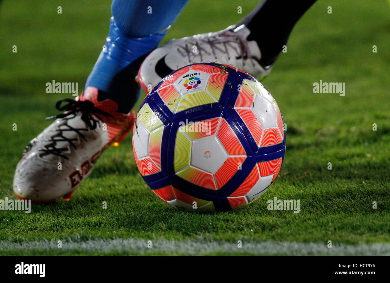 Detail of the feet of a soccer player running with the ball Stock Photo
