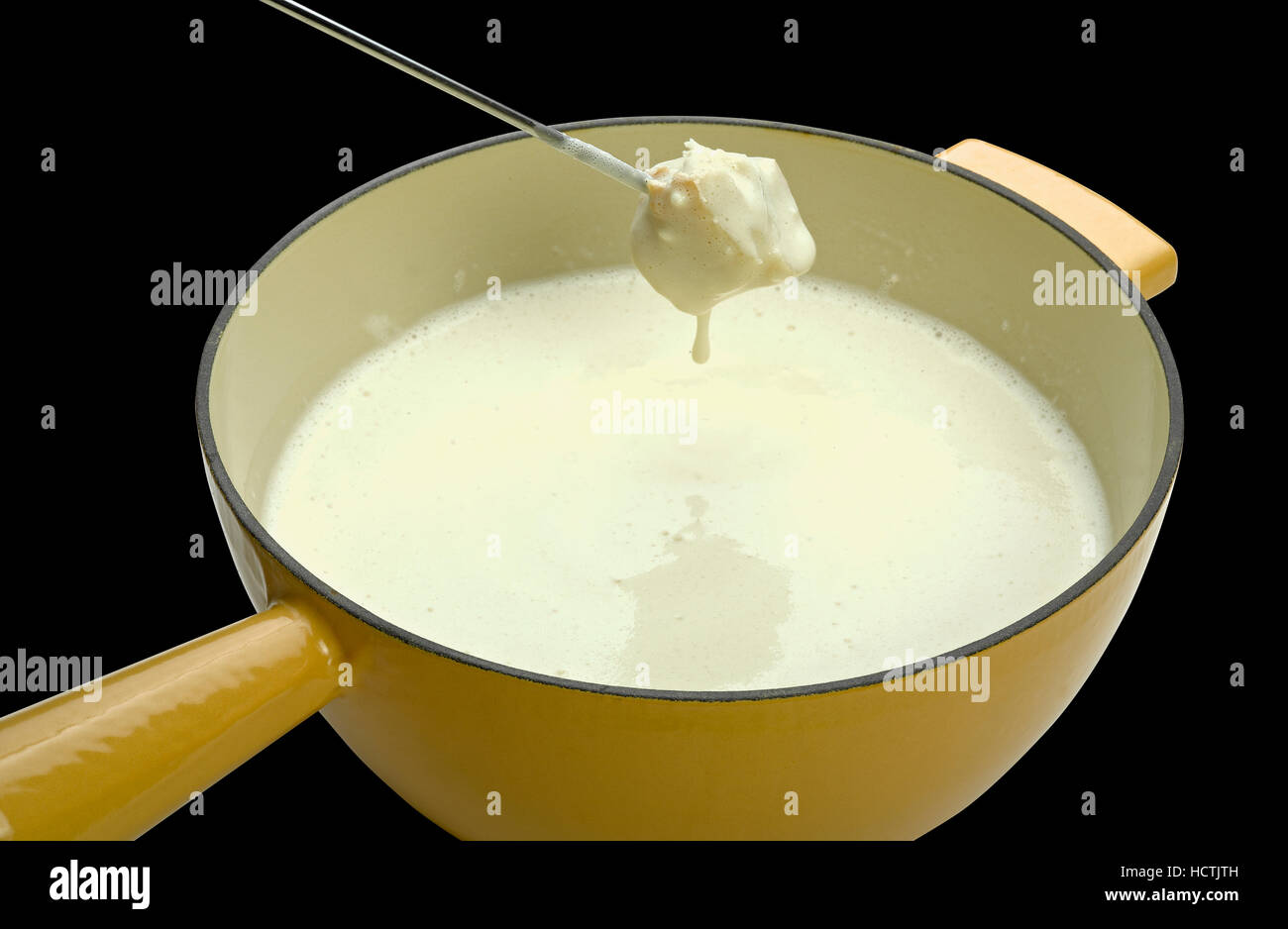 cheese fondue on black background (clipping path Stock Photo Alamy