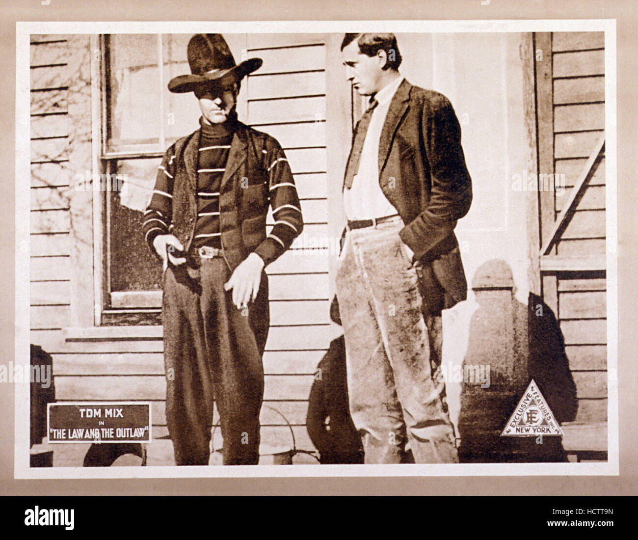 THE LAW AND THE OUTLAW, left: Tom Mix on lobbycard, 1913 Stock Photo