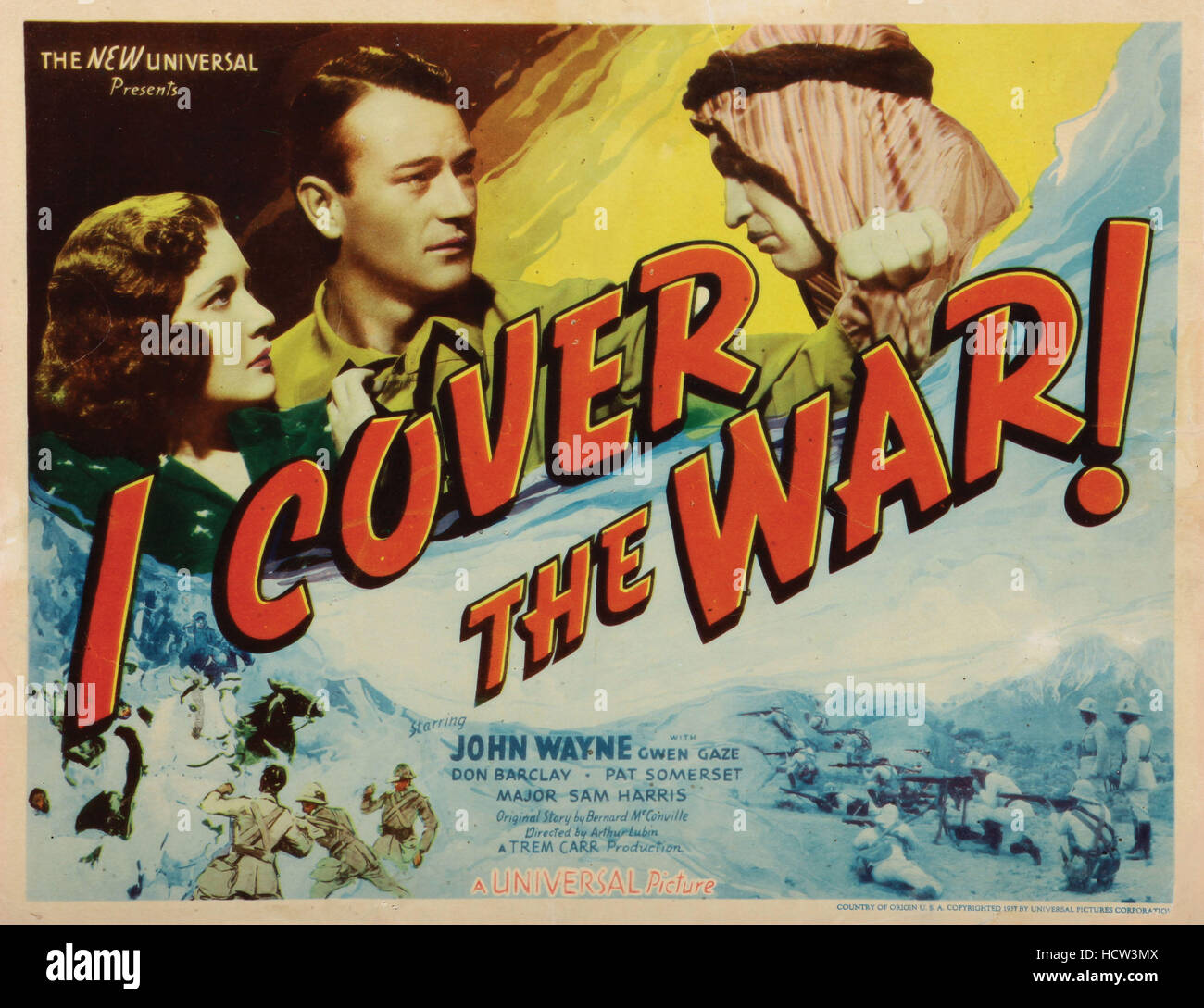 I COVER THE WAR, from left, Gwen Gaze, John Wayne, 1937 Stock Photo