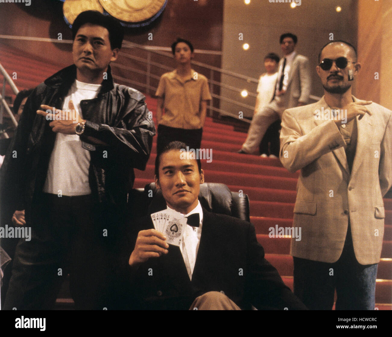 GOD OF GAMBLER'S RETURN, (aka GOD OF GAMBLERS 2, aka DU SHEN 2), Chow  Yun-Fat, (left), Tony Leung Ka Fai, (center), 1994. ©Mei Stock Photo - Alamy