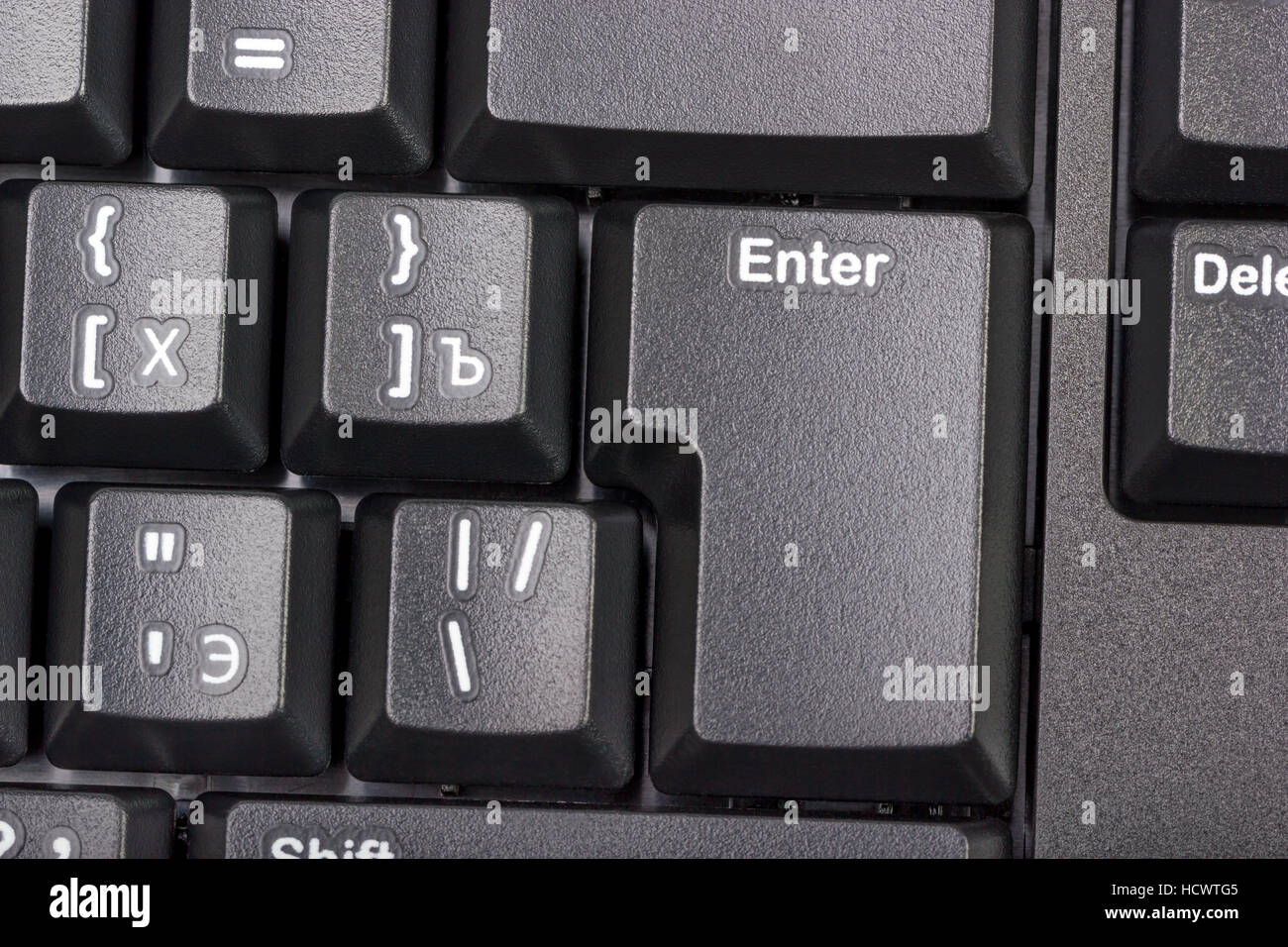 Electronic collection - close-up black computer keyboard with russian letter and key enter Stock Photo
