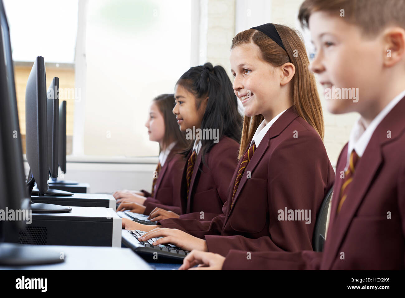 Computer school pupils uniform hires stock photography and images Alamy