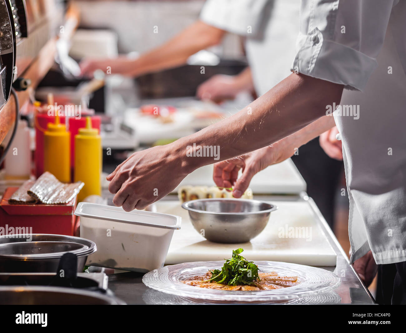 Chefs preparing food Stock Photo