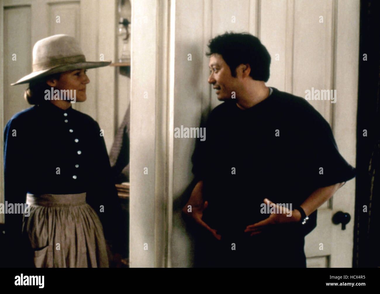 RIDE WITH THE DEVIL, Jewel Kilcher, director Ang Lee, on set, 1999. ©Universal/courtesy Everett