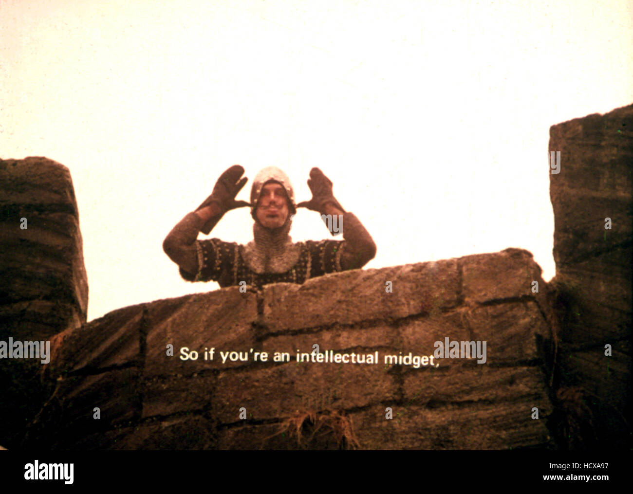 MONTY PYTHON AND THE HOLY GRAIL, John Cleese, taunting King Arthur, 1975. (c)Python Pictures. Courtesy: Everett Collection. Stock Photo