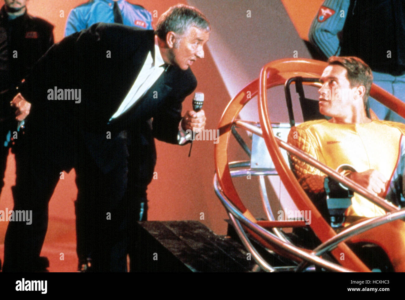 RUNNING MAN, THE, Richard Dawson, Arnold Schwarzenegger, 1987 Stock Photo Alamy