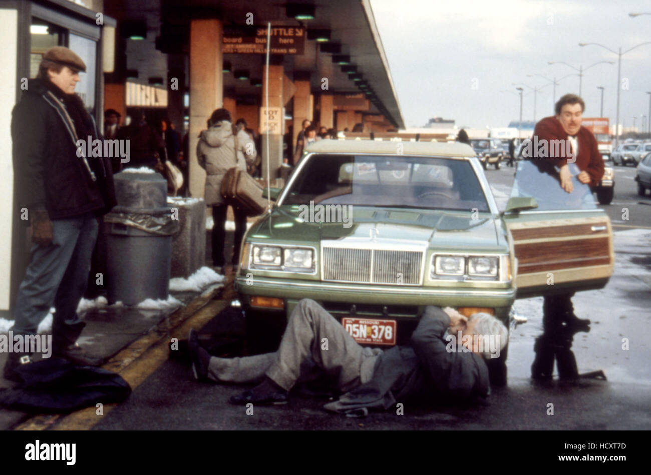 PLANES, TRAINS AND AUTOMOBILES, Steve Martin (bottom middle), John