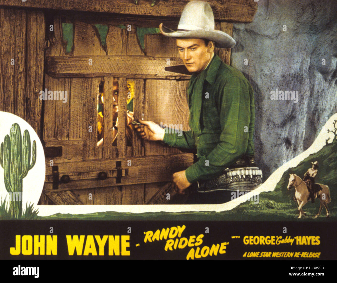 RANDY RIDES ALONE, John Wayne, 1934 Stock Photo - Alamy