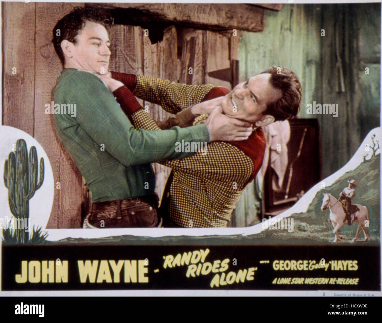 RANDY RIDES ALONE, John Wayne, Yakima Canutt, 1934 Stock Photo - Alamy