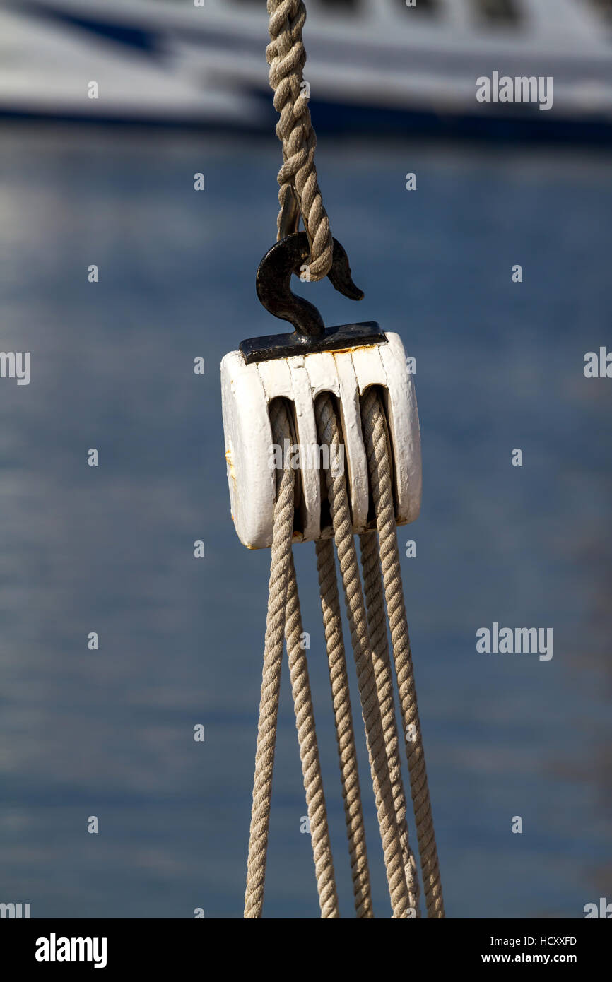 Sailing rope tension with the fishing pulley Stock Photo