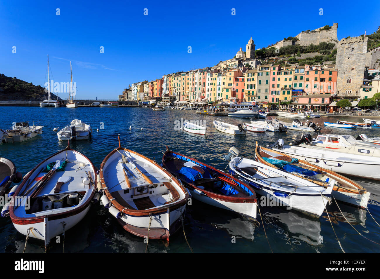 Portovenere (Porto Venere), UNESCO, colourful harbourfront houses, boats and castle, Ligurian Riviera, Liguria, Italy Stock Photo