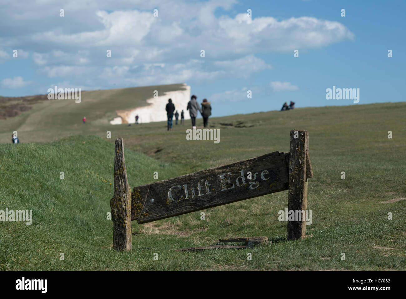 A warning sign near the cliffs at Beachy Head on the south coast, South Downs National Park, East Sussex, UK Stock Photo