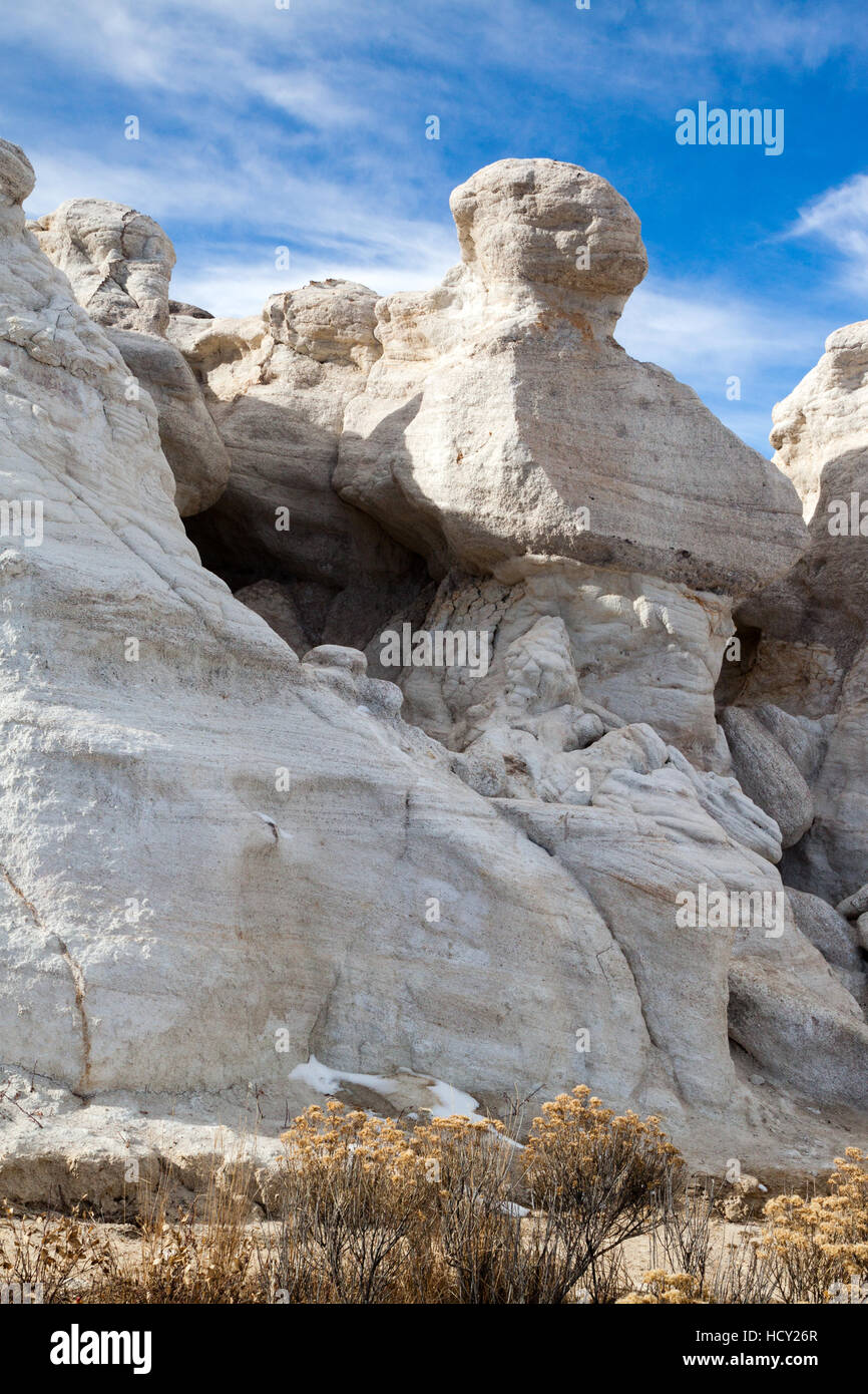 White clay hoodoos rise against the sky in the Paint Mines Interpretive Park near Calhan, Colorado, USA. The clay in these formations was used by Nati Stock Photo